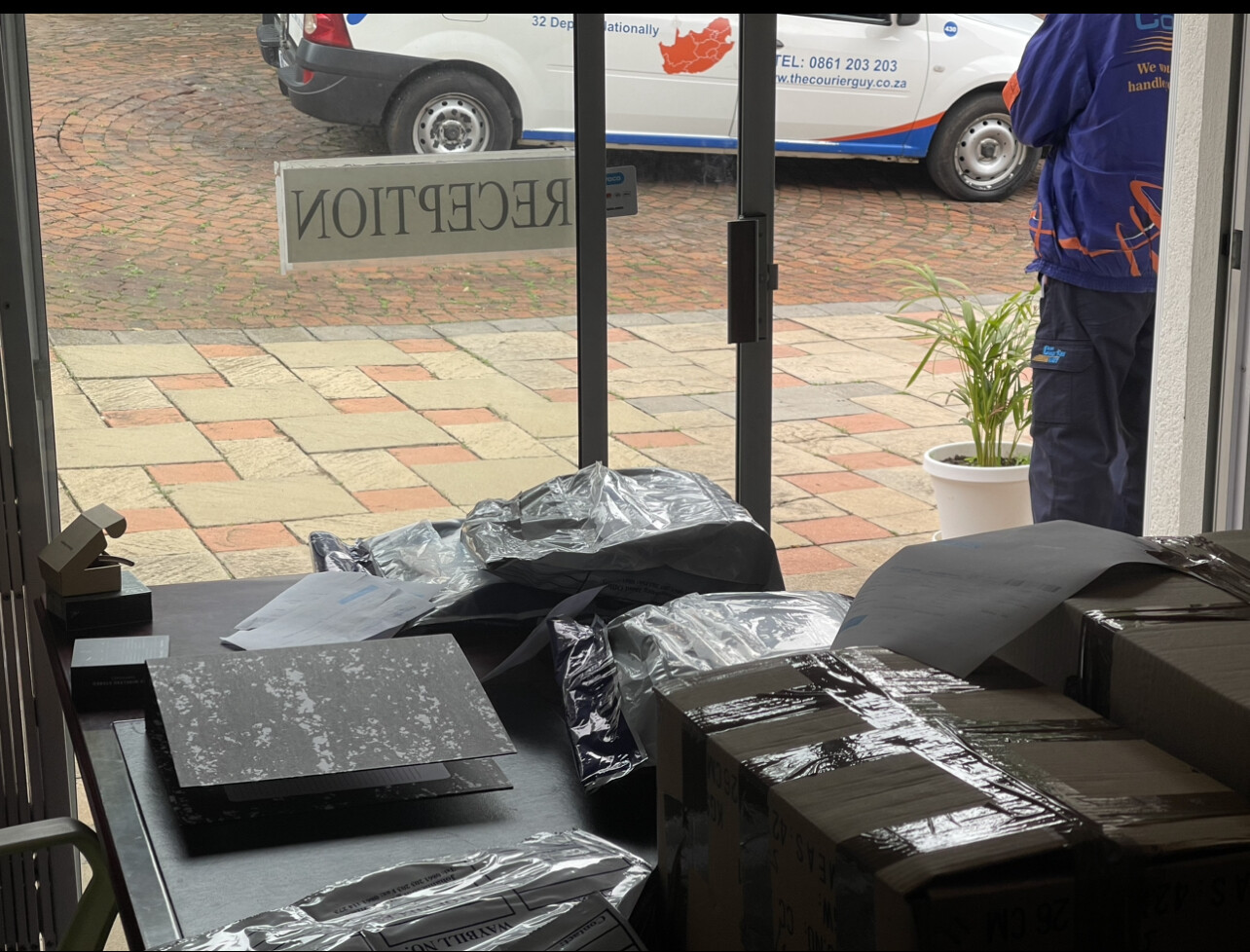 Courier Guy collecting parcels at David Jones Southern Africa Reception 19 December 2022