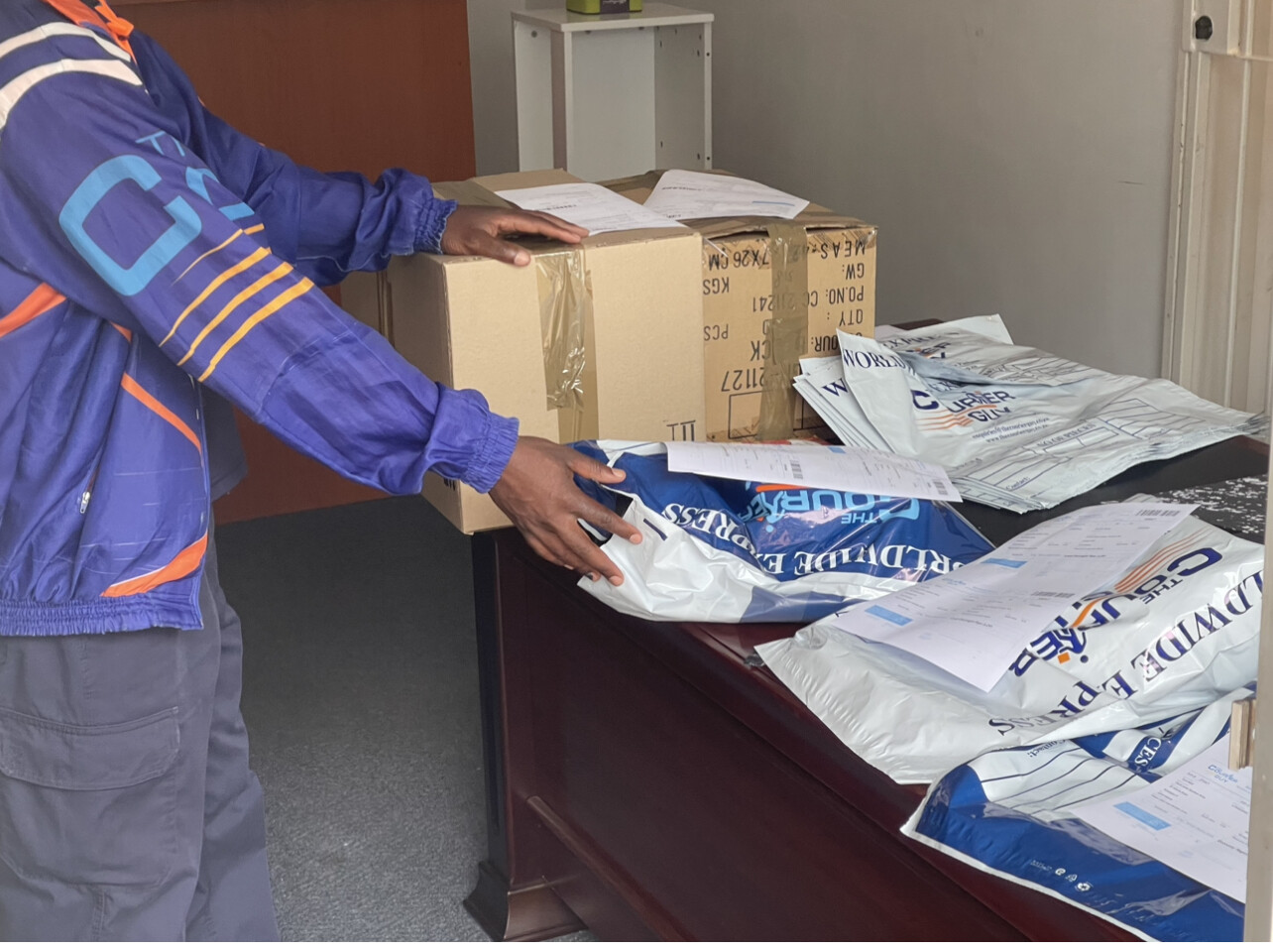 Courier Guy collecting parcels at David Jones Southern Africa Reception 19 December 2022