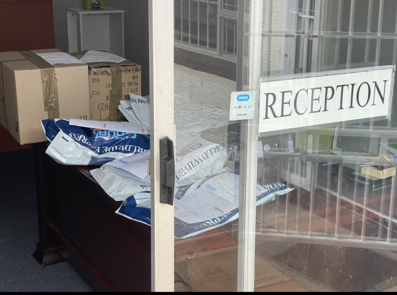 Courier Guy collecting parcels at David Jones Southern Africa Reception 19 December 2022