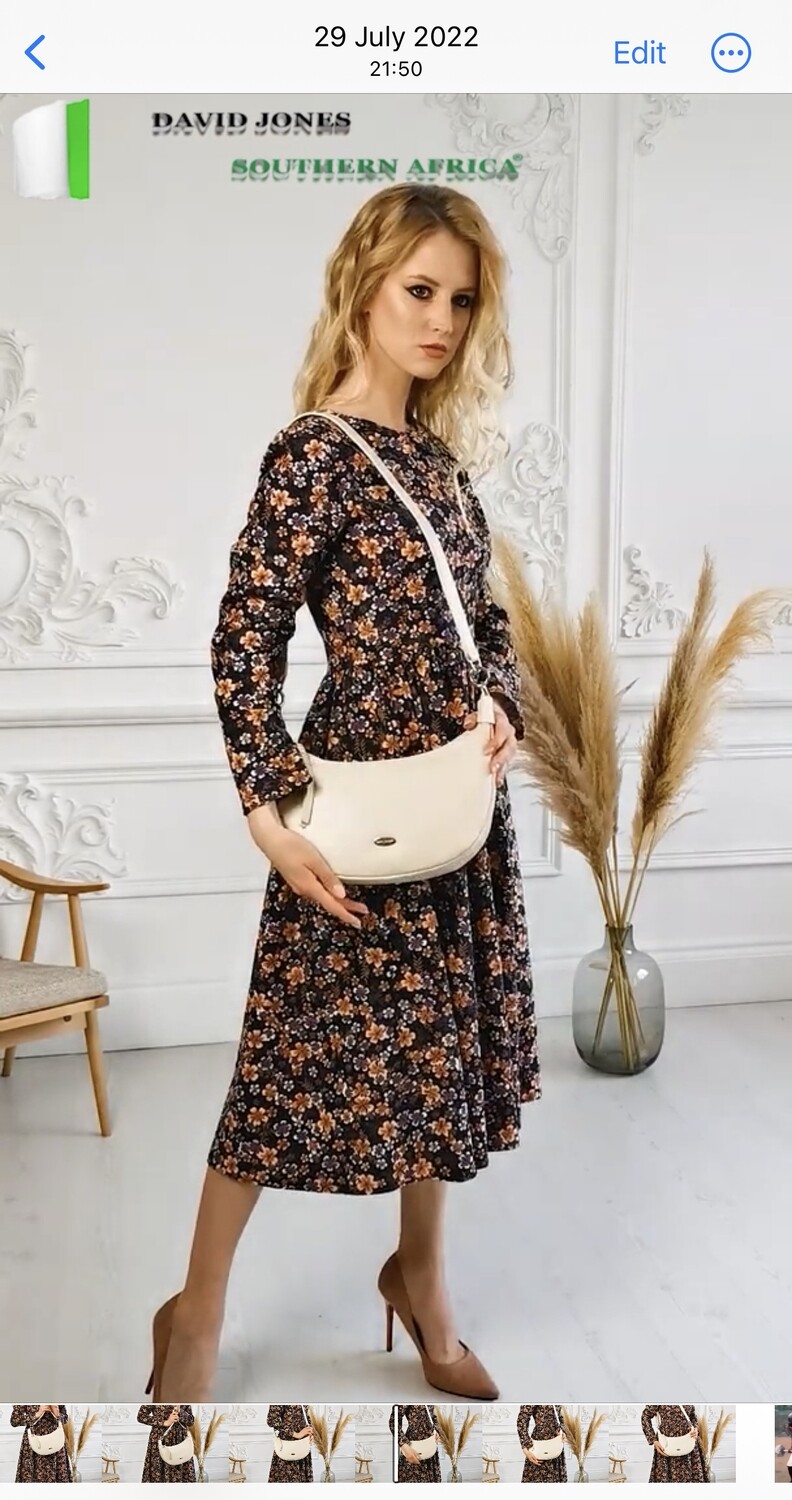 A shoulder bag that makes a statement.. Really it makes you speak French without even saying a WORD....