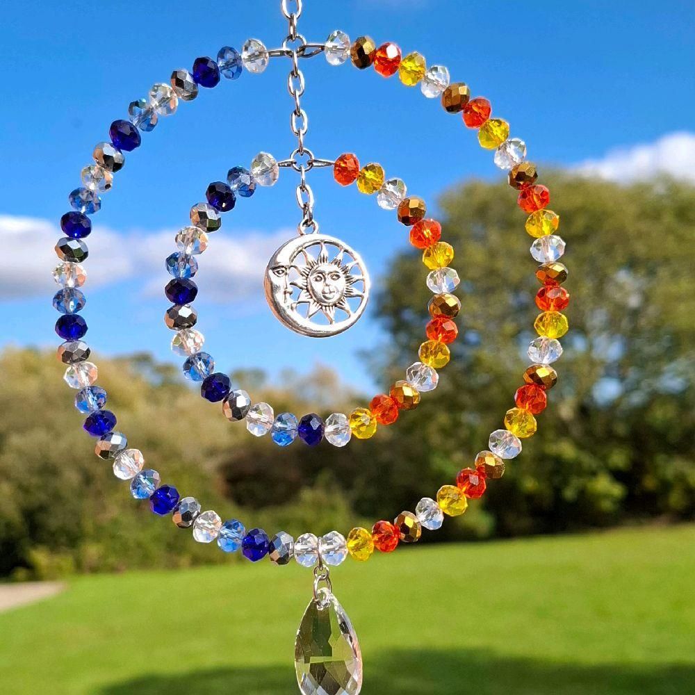 Sun & Moon Split Colour Sun Catcher Available In Two Sizes Sun & Moon Split Colour Sun Catcher Available In Two Sizes