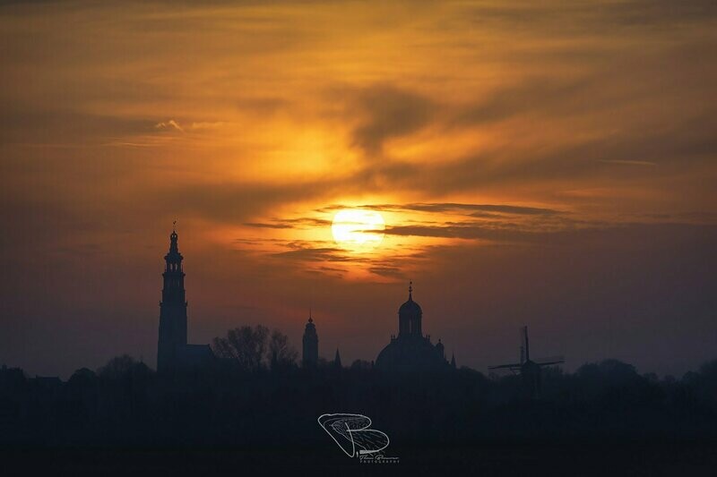 Middelburg onder vurige zonsondergang