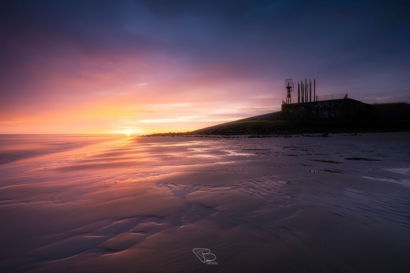 Kleurrijke zonsondergang Nollehoofd