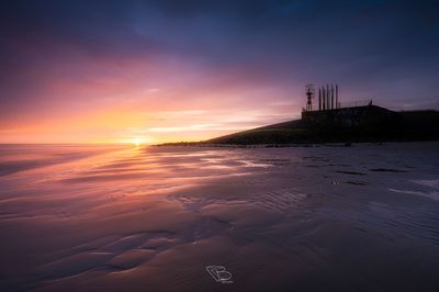 Kleurrijke zonsondergang Nollehoofd