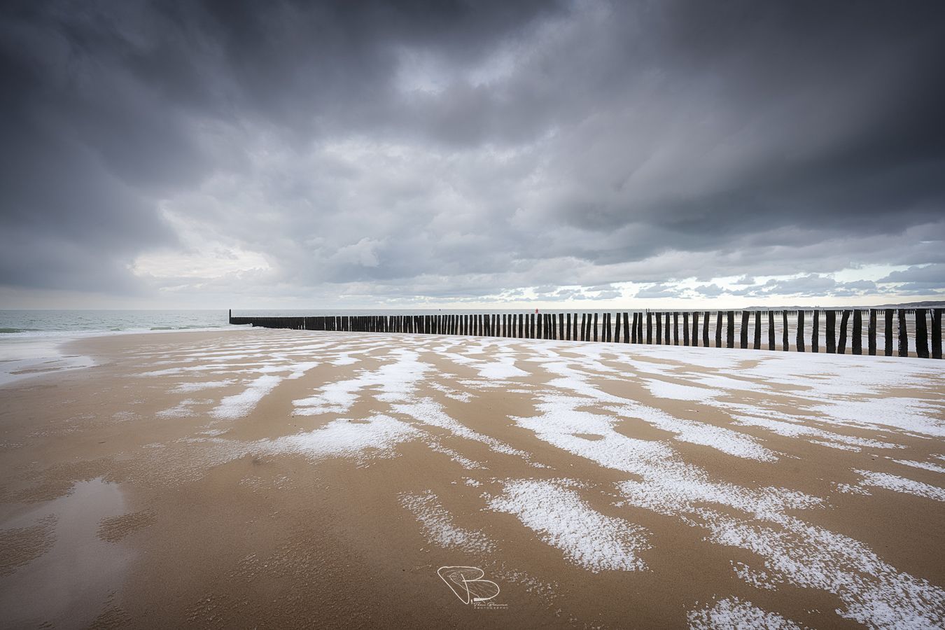Sneeuwpatronen op het strand