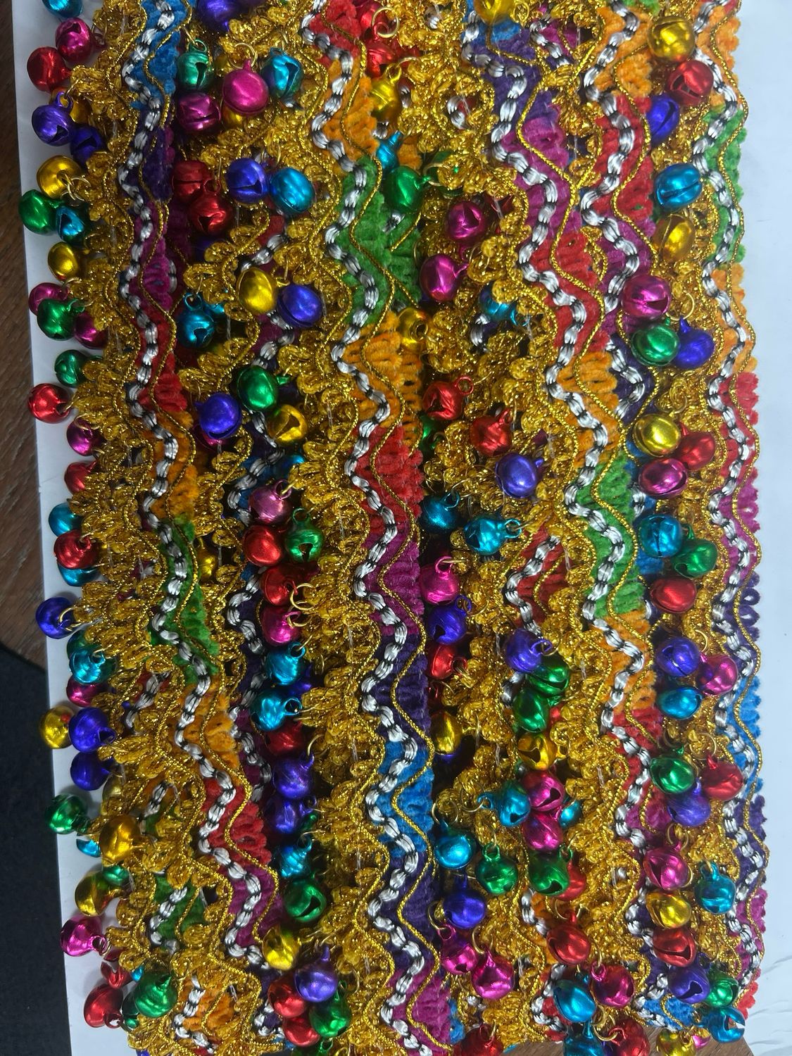 Rainbow Metallic Triangle Fringe With Bell