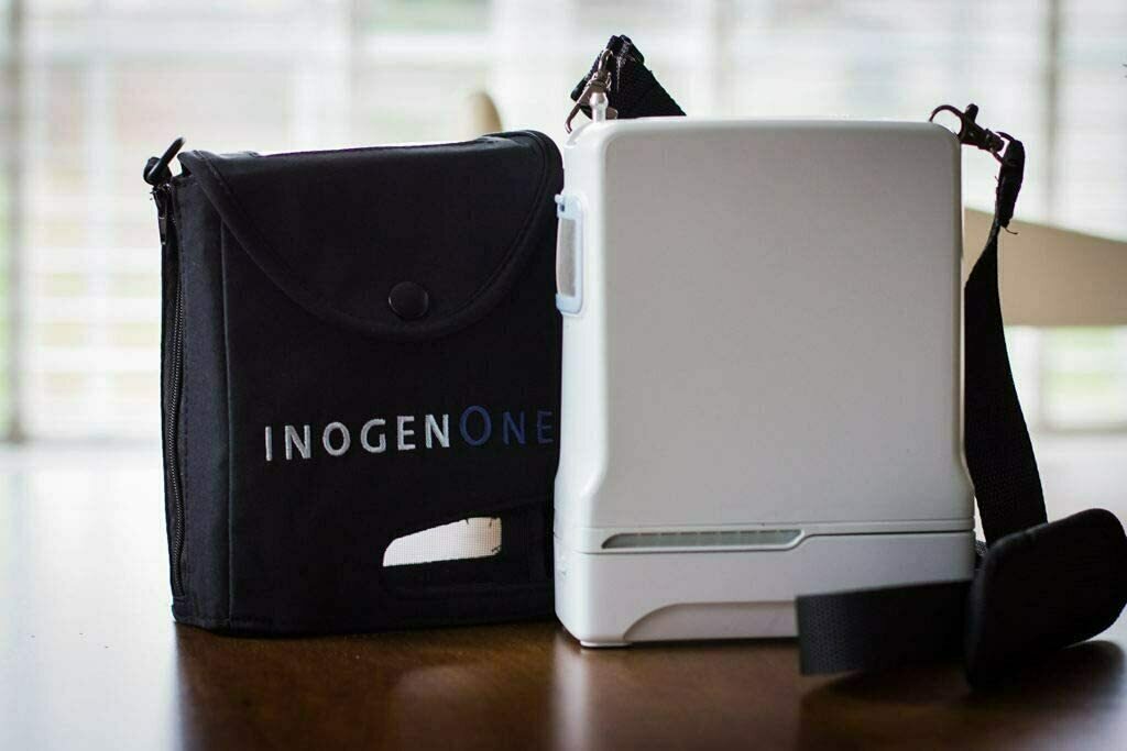 Inogen One G4 Lightweight Portable Oxygen Concentrator with 02 batteries ( one 8 cell and one 4 cell battery)