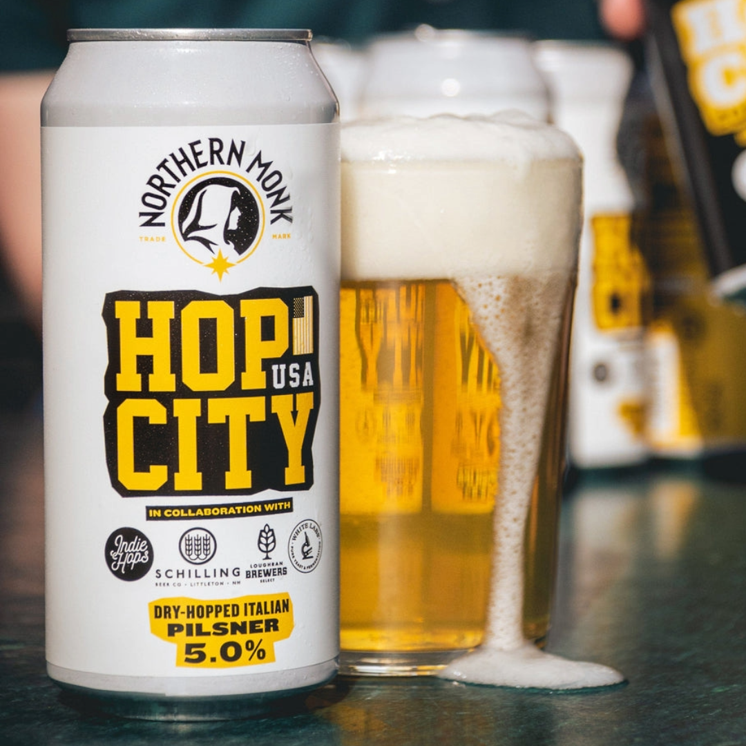 Northern Monk x Schilling x Loughran Hop City USA Pilsner Northern Monk x Schilling x Loughran Hop City USA Pilsner