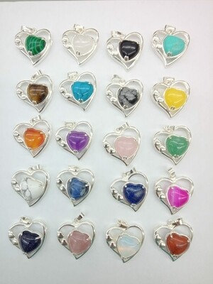 Dije corazón con baño