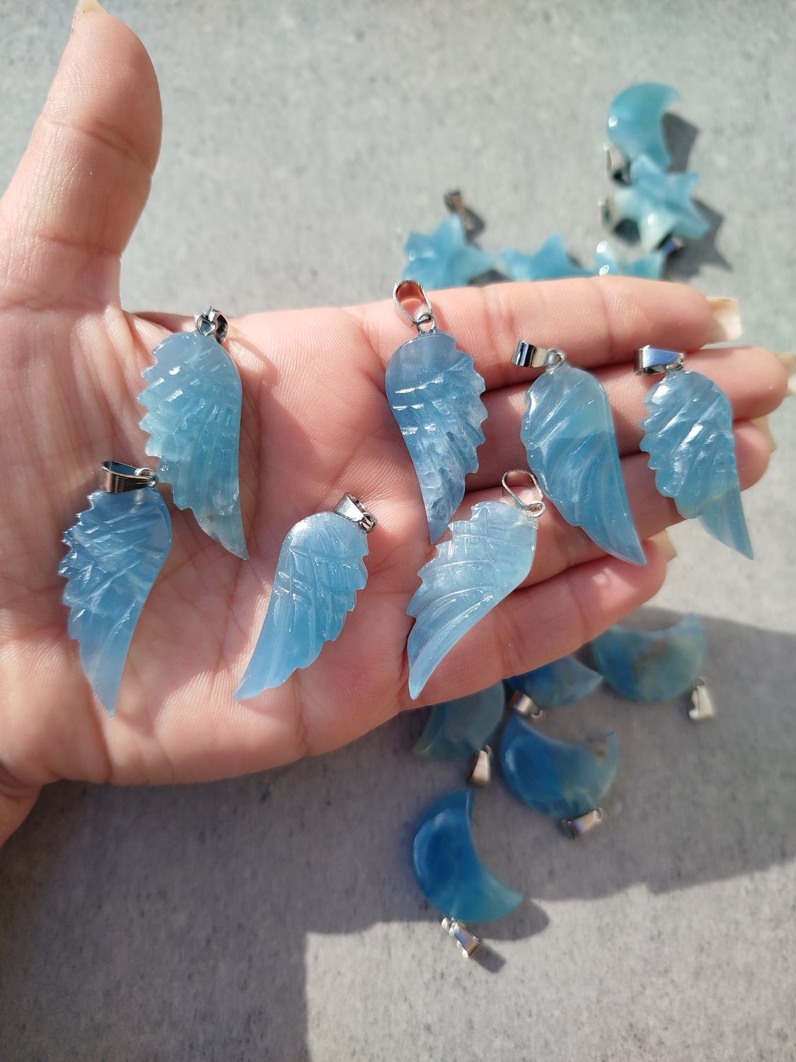 Dijes alas onix cielo