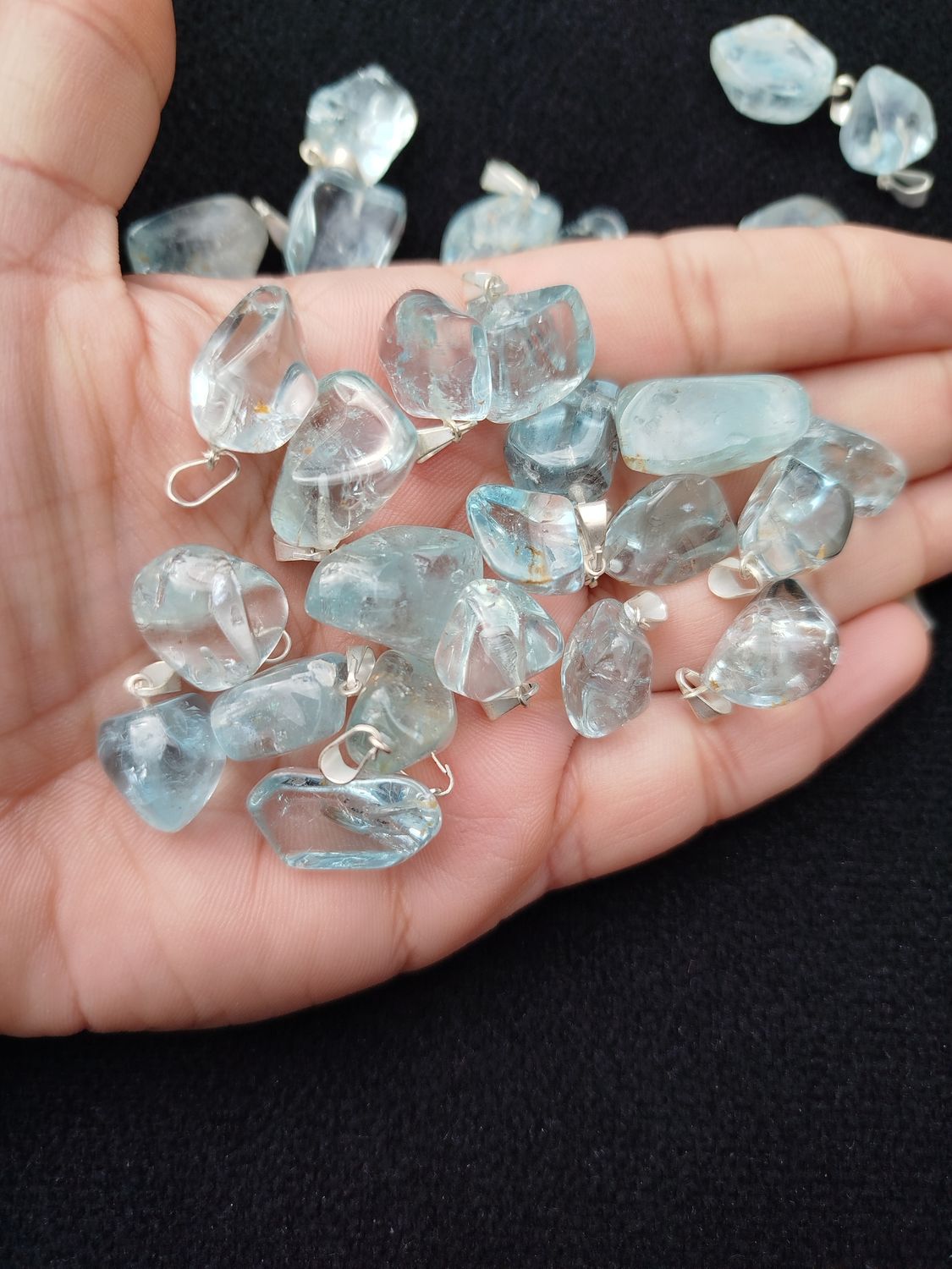 Dije topacio azul con engarce simple