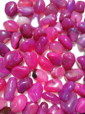 Agata fucsia rolada por 100grs