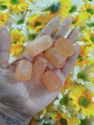 Cilindros selenita melocotón por 100grs