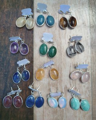 Aritos ovales colgantes con baño de plata