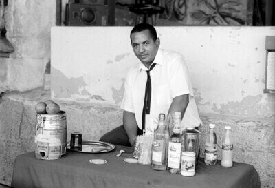 Barman On The Malecon: Havana, Cuba, 2002