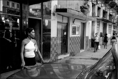 Woman Outside Boutique, Havana, Cuba, 2002