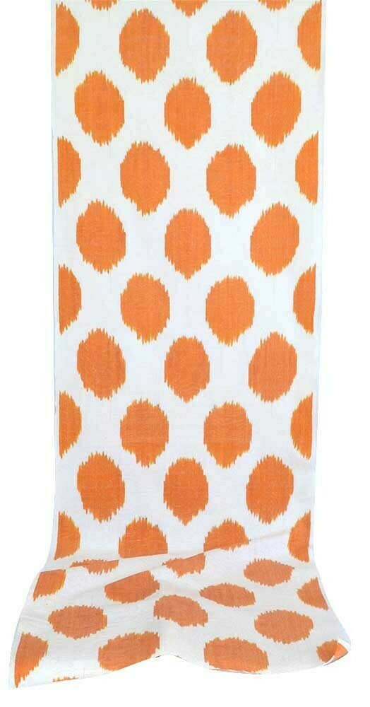 Orange polkadot ikat fabric