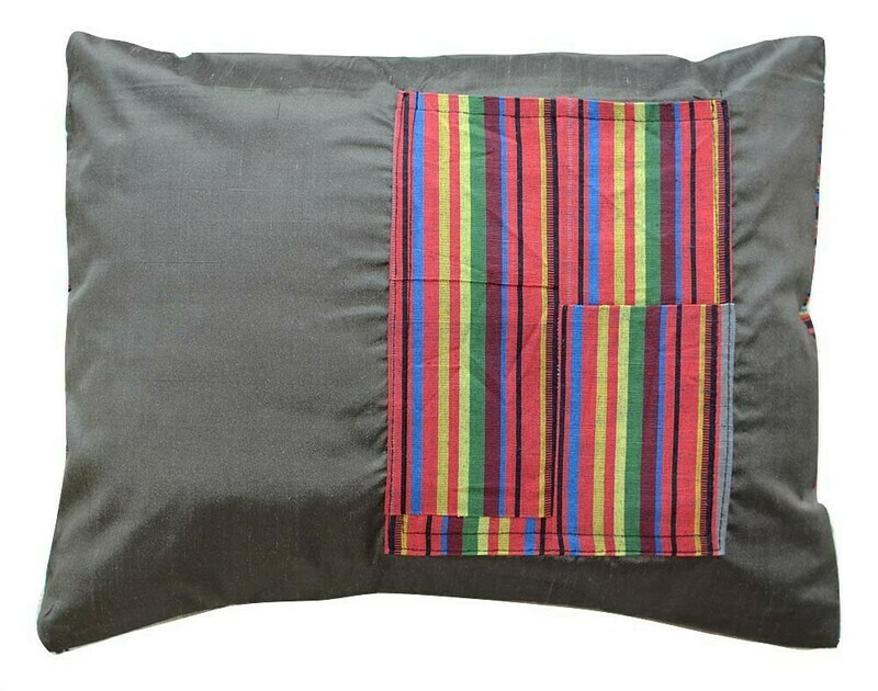 Gray bekasam pillow cover with a book pocket