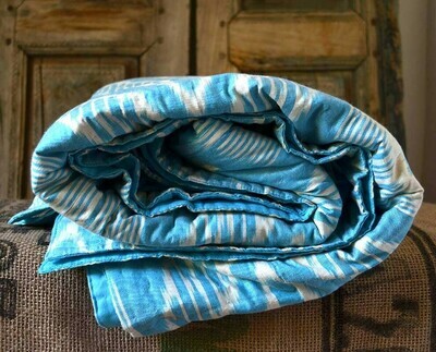 Blue ikat pattern bedspread