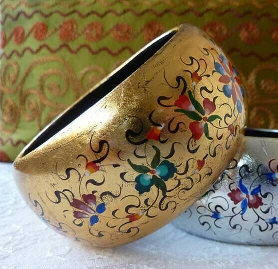 Hand painted bracelet on a golden foil