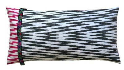 Black, white and hot pink zigzag lumbar ikat cushion cover