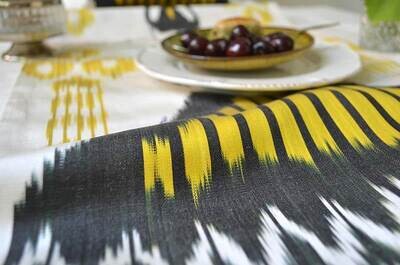 Amulet ikat pattern white, black and yellow table runner