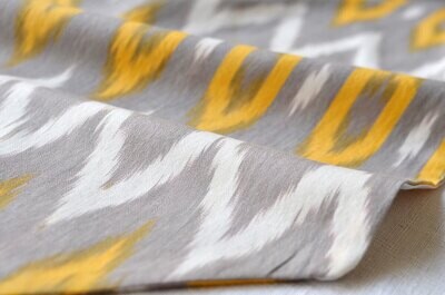 Gray, white and yellow geometric cotton ikat table runner