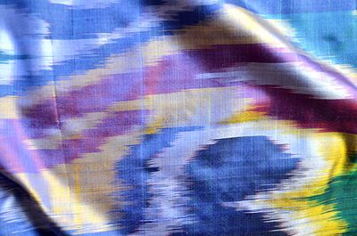 Vibrant Blue Handwoven Silk Ikat Scarf With Golden Accents