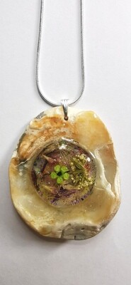 Golden oyster shell and flower pendant