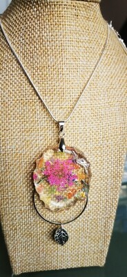 Pink flower and circle pendant