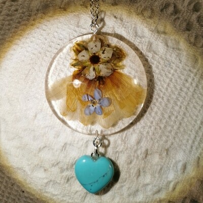 3 flowers and heart pendant