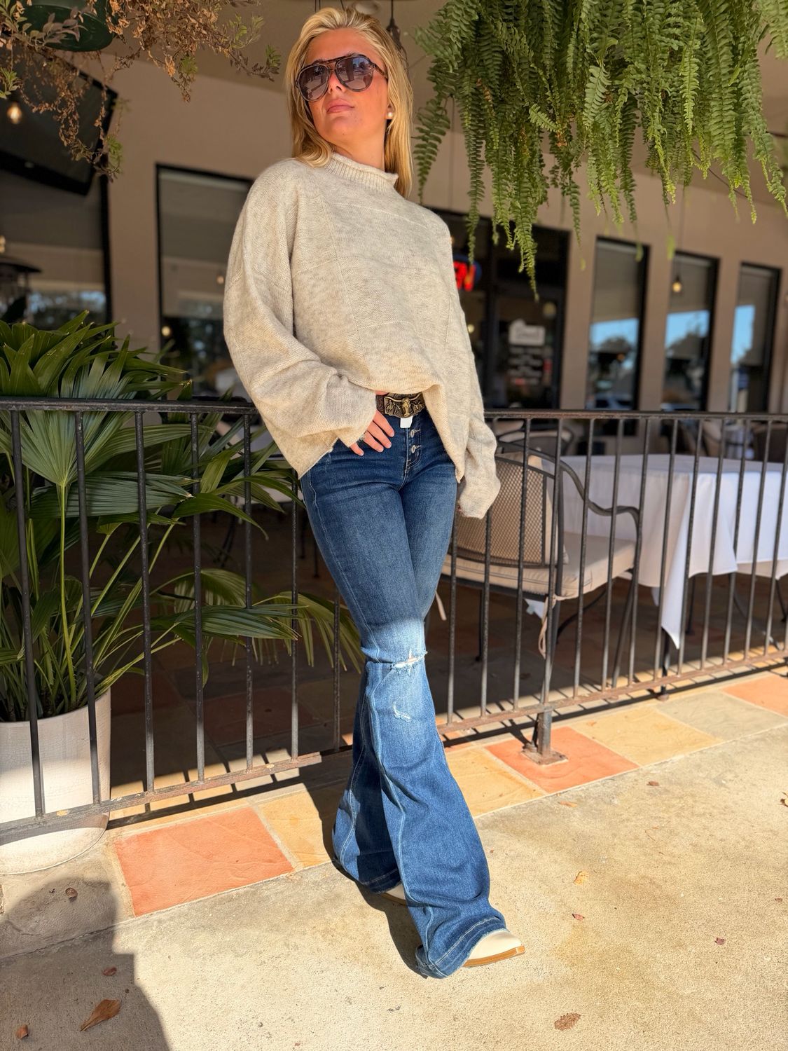 Mid Rise Button Up Distressed Flare