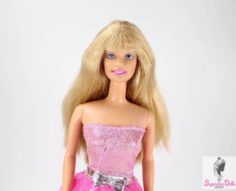 Late 90's/2000s Era Barbie Doll in clone Fashion