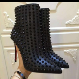 Spiked ladies boots