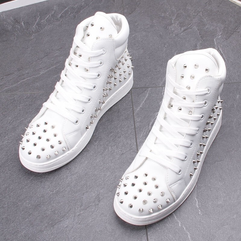 White spike boots 