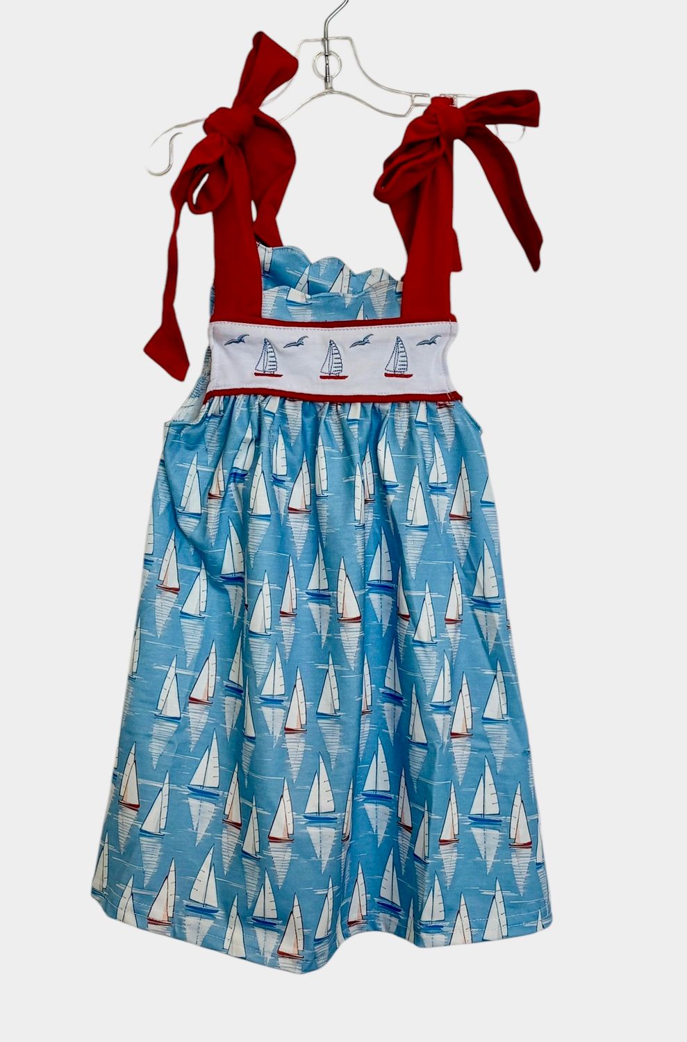 Embroidered sailboats dress