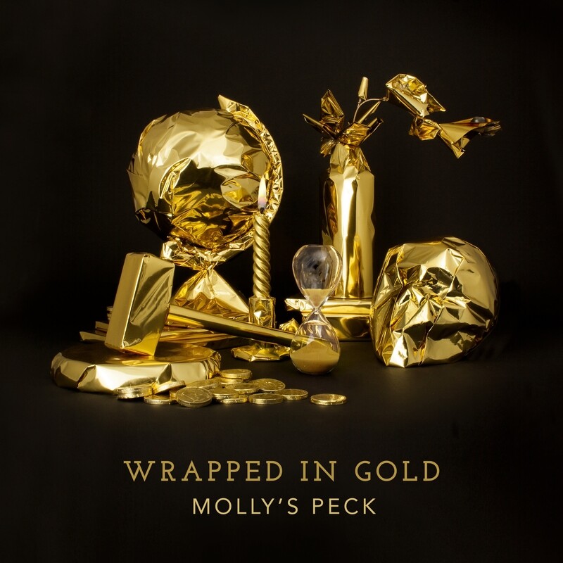 Wrapped in Gold: Debut Album