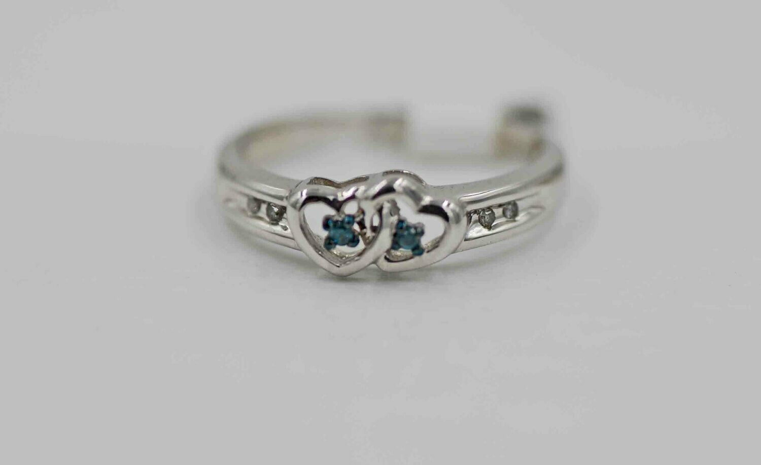 10k wg double heart ring w/ blue & white rbc diamonds