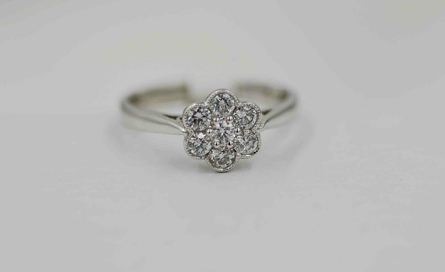 14kw 7 dia flower style ring .53cttw