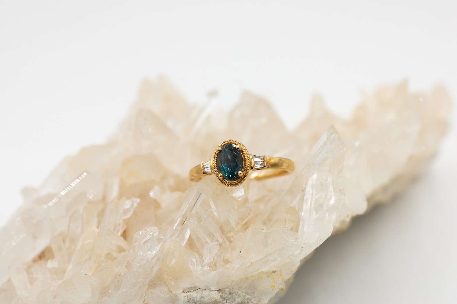 Oval green sapphire w/ baguette diamond ring - yg