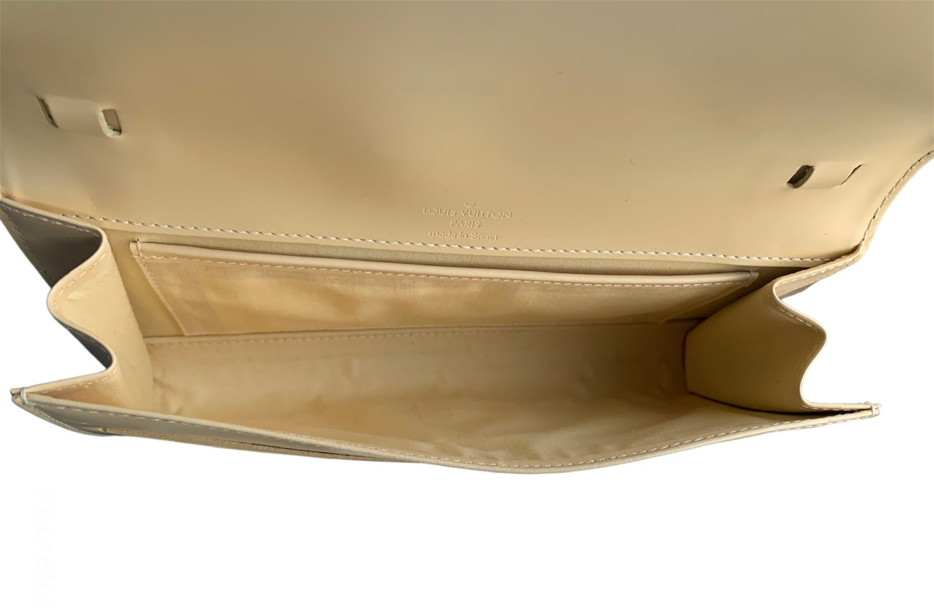 Honfleur leather clutch bag Louis Vuitton Beige in Leather - 19740204