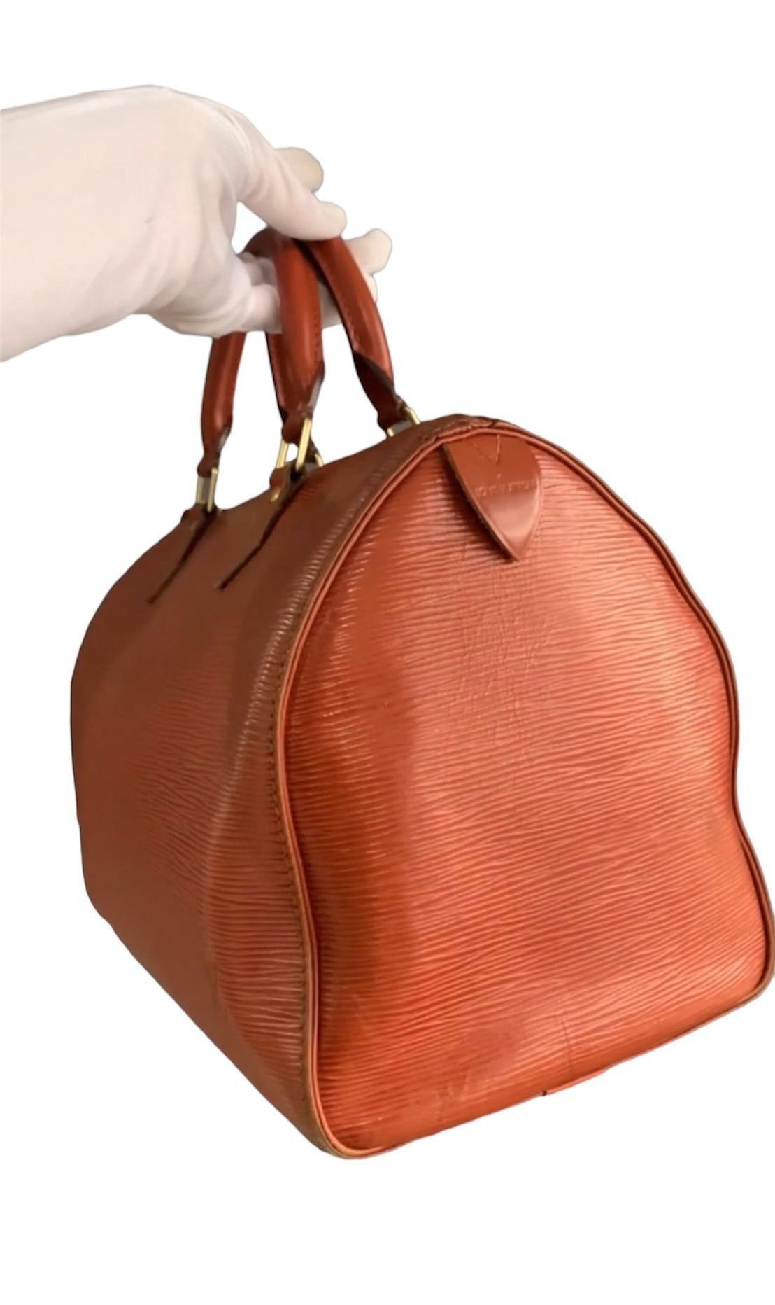 Speedy leather handbag Louis Vuitton Brown in Leather - 32349464