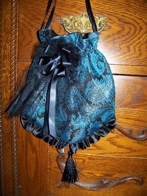Ladies Civil War, Victorian Hat and Ridicule, Teal and Black Paisley Brocade rose print with Black Satin ruffles. Teardrop Hat with Black Satin Ruffles and Large Ribbon Rose