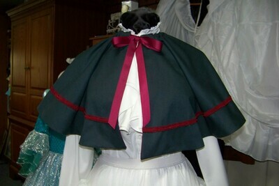Dickens Colonial cape,Civil War cape,Victorian,costume Cape only one size fit all Dark Green cotton blend reversible with Burgundy on back and burgundy braid.