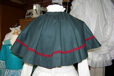 Dickens Colonial cape,Civil War cape,Victorian,costume Cape only one size fit all Dark Green cotton blend reversible with Burgundy on back and burgundy braid.