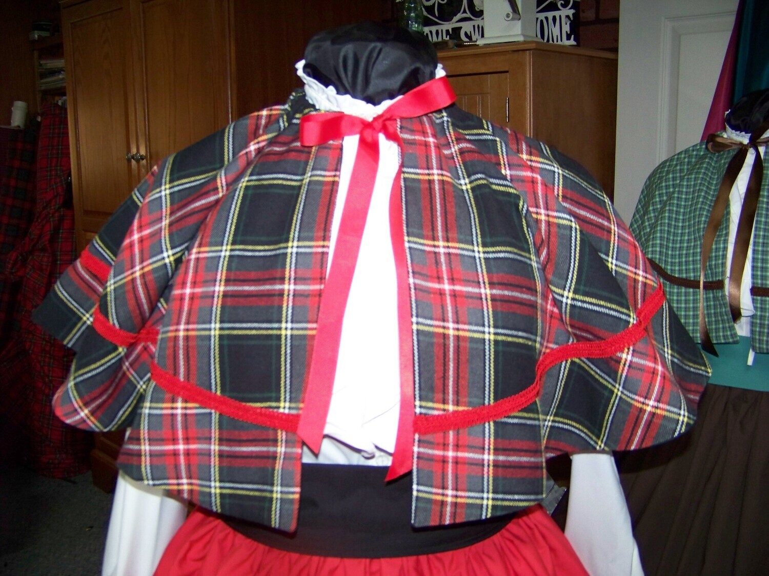 Mrs. Claus or Christmas Caroler costume red, black, yellow and white cotton homespun plaid CAPE ONLY with red braid and black cotton blend lining one size fits most. Handmade USA