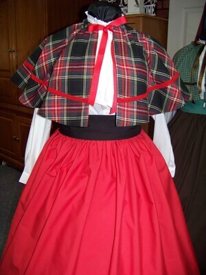 Mrs. Claus or Christmas Caroler costume red, black, yellow and white cotton homespun plaid CAPE ONLY with red braid and black cotton blend lining one size fits most. Handmade USA