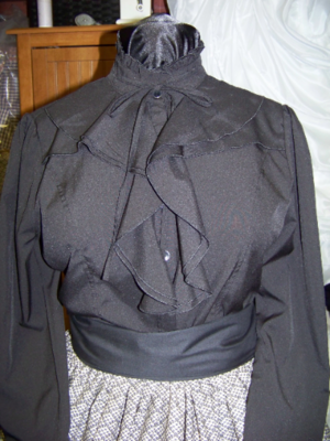 Civil War style ladies blouse Black cotton blend with ruffles in the front and around the neck