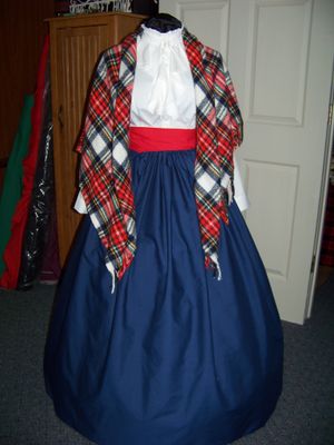 Dickens Costume Navy Blue Skirt with Red Sash and Navy Blue, Red, green, black, orange and white rectangle Shawl one size fits most.