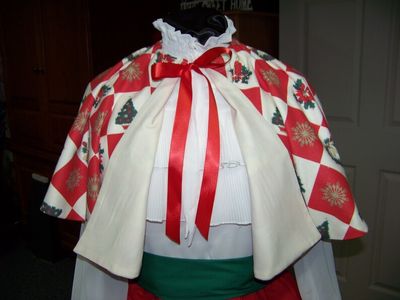 Dicken's Christmas Caroler Cape Only Red and cream and green checked cape reversible cream solid on back one size fits most Handmade USA